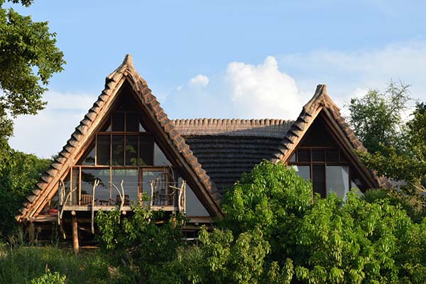 Nile Safari Lodge harmoniously blends nature with luxury on the shores of Uganda's River Nile.