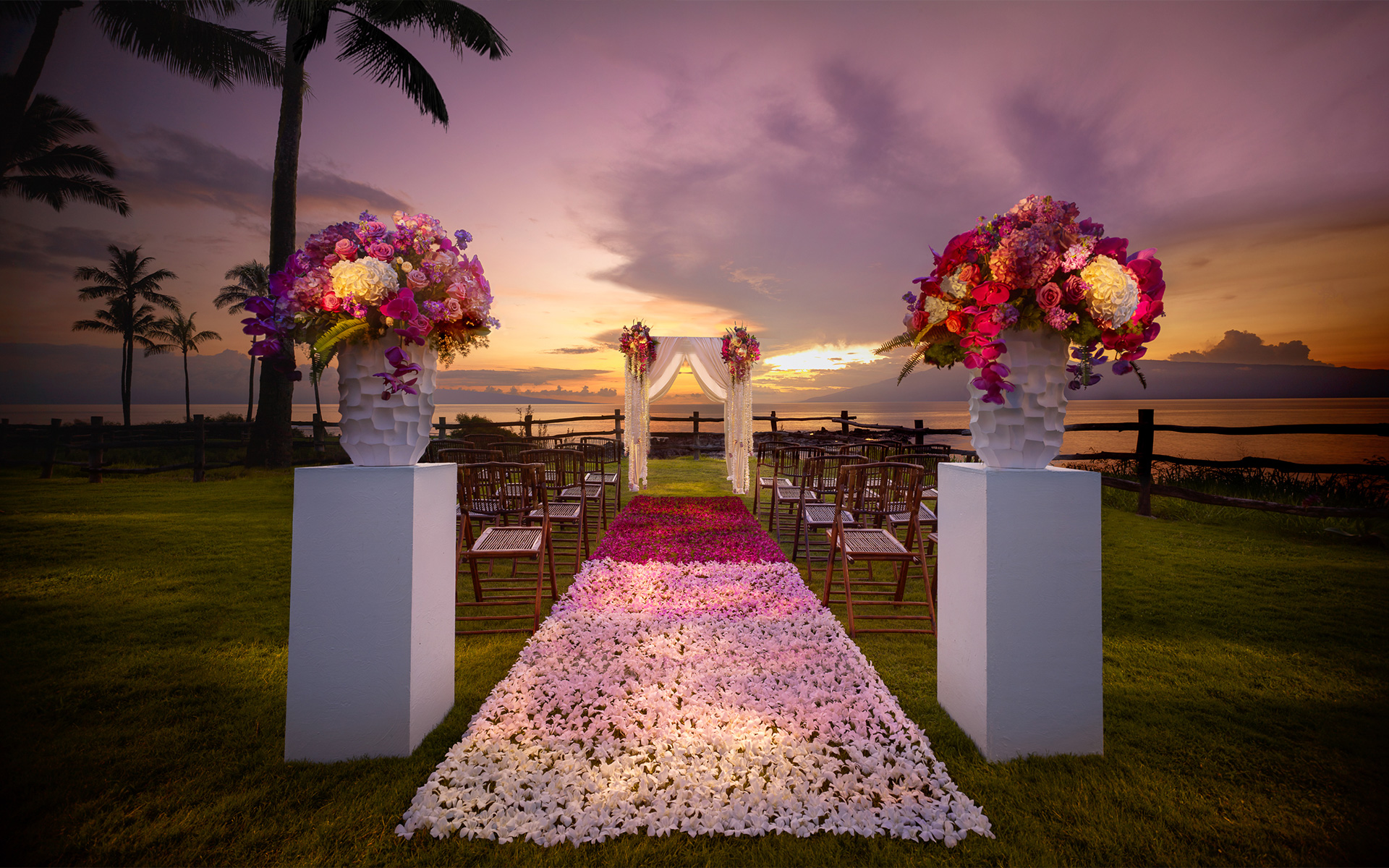Sunset wedding ceremony at Namalu Lawn located between The Cliff House and Kapalua Bay