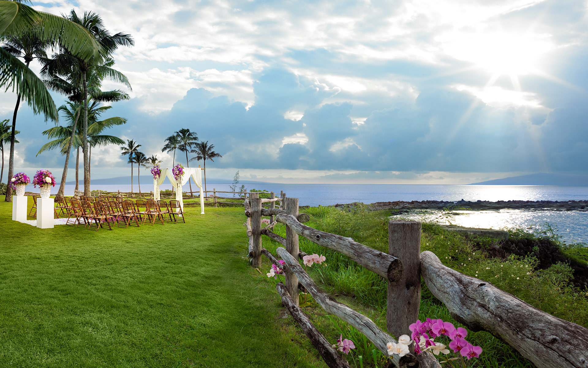 Wedding ceremony at Namalu Lawn located between The Cliff House and Kapalua Bay