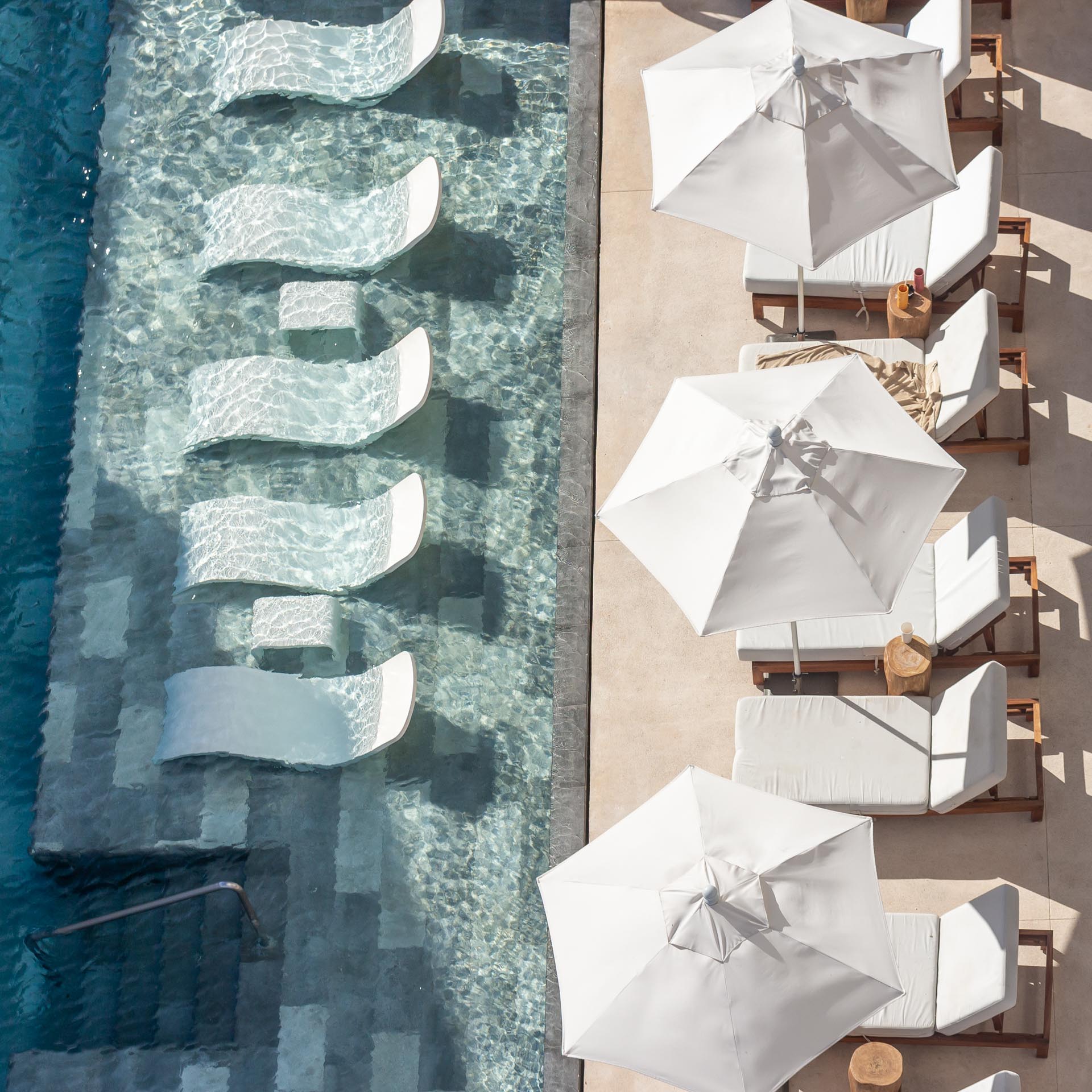 Aerial of pool and loungers