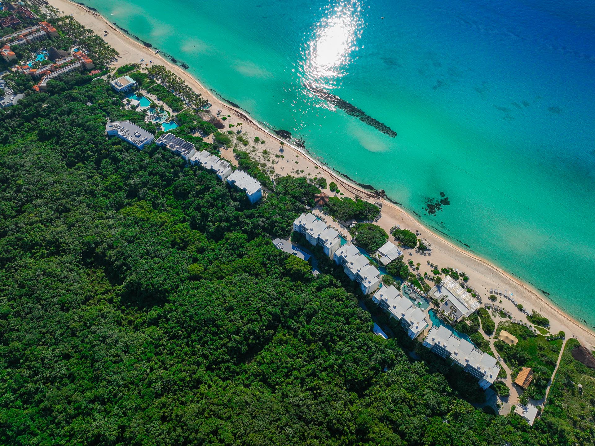 Aerial of property and beach
