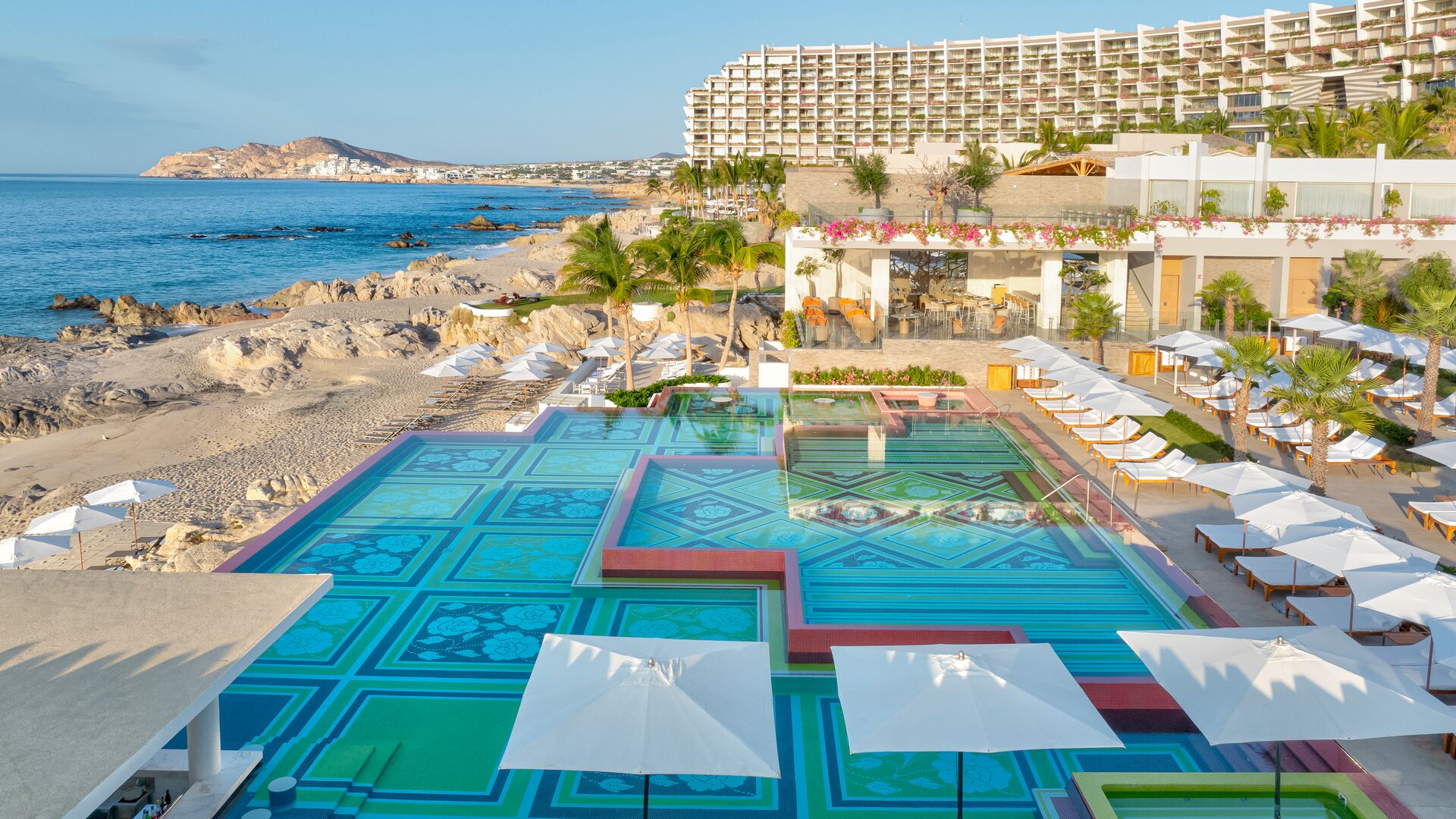 Exterior Side View with Pool and Coastline