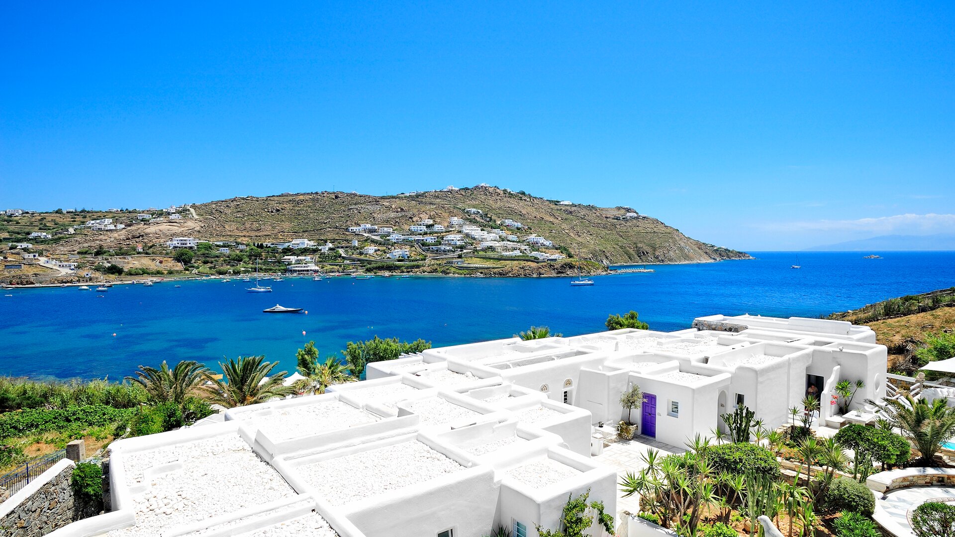 Exterior Shot From Back of Hotel with View to the Sea