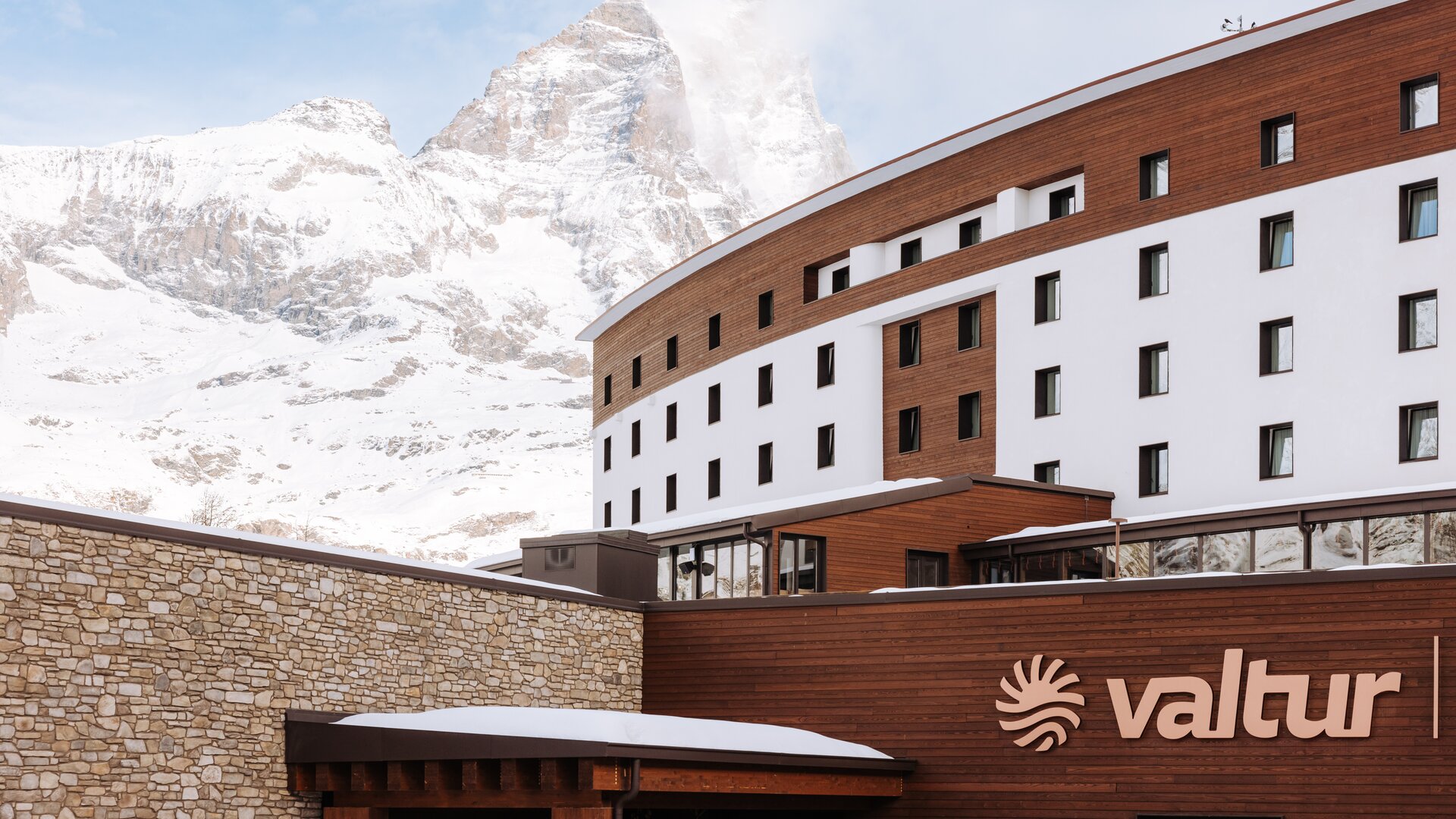 Exterior View with Snowed Mountains in Background