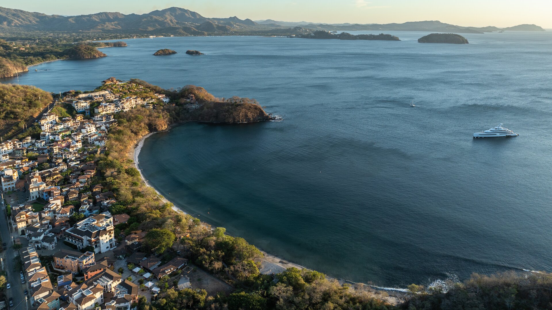 Wide Aerial View of Hotel, Surrounding Town Las Catalinas and Coastline