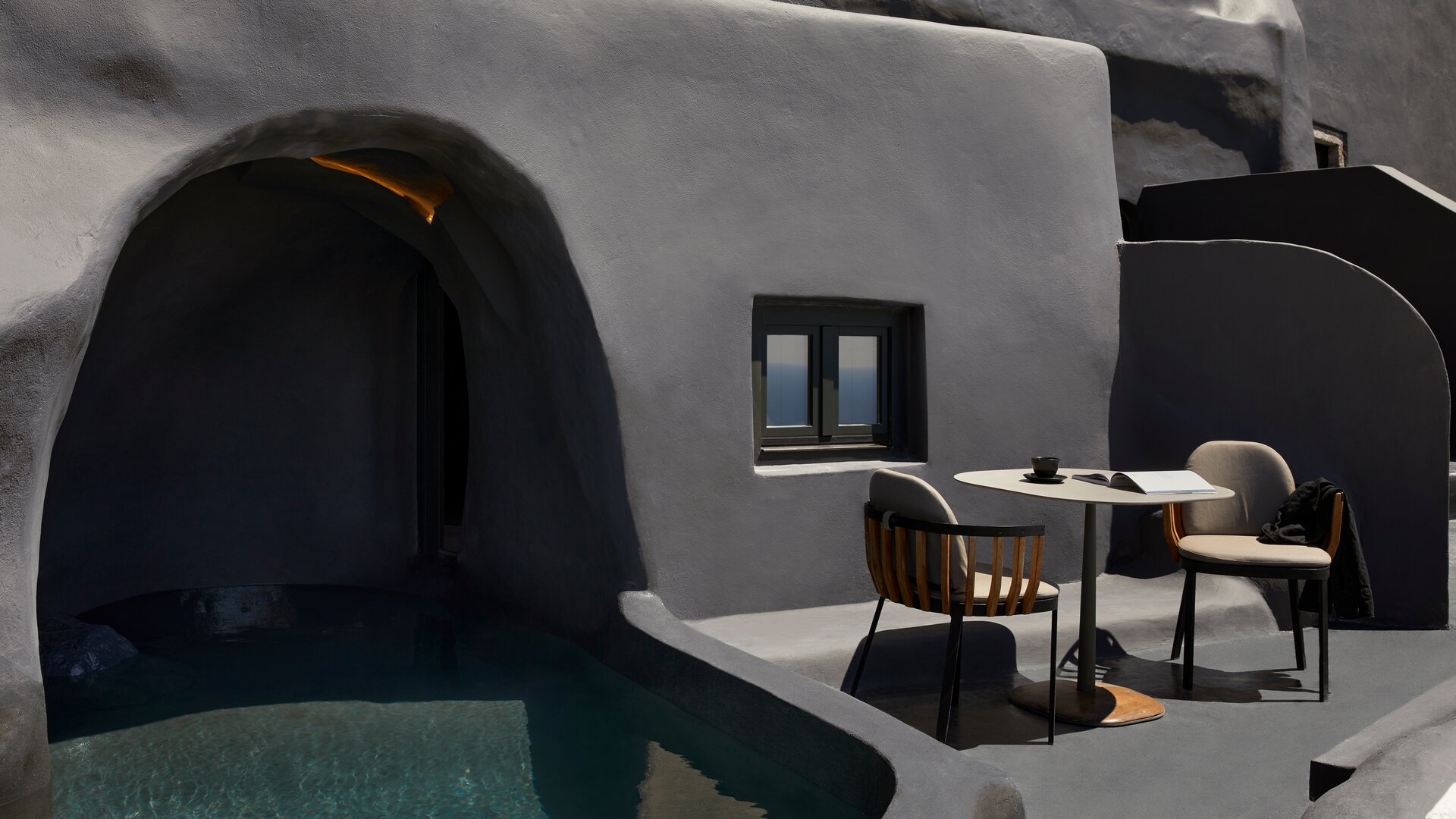 Junior Suite Sunset View with Heated Cave Pool | Exterior & Terrace