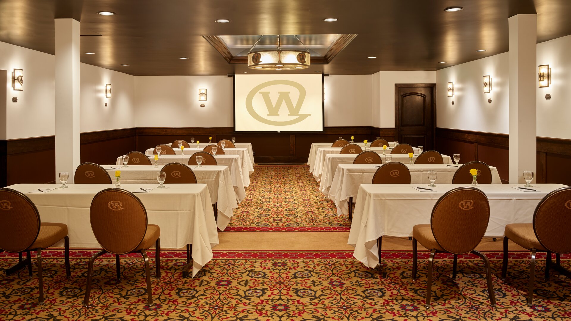 The Clymer Room Event Space with Classroom Seating Arrangement