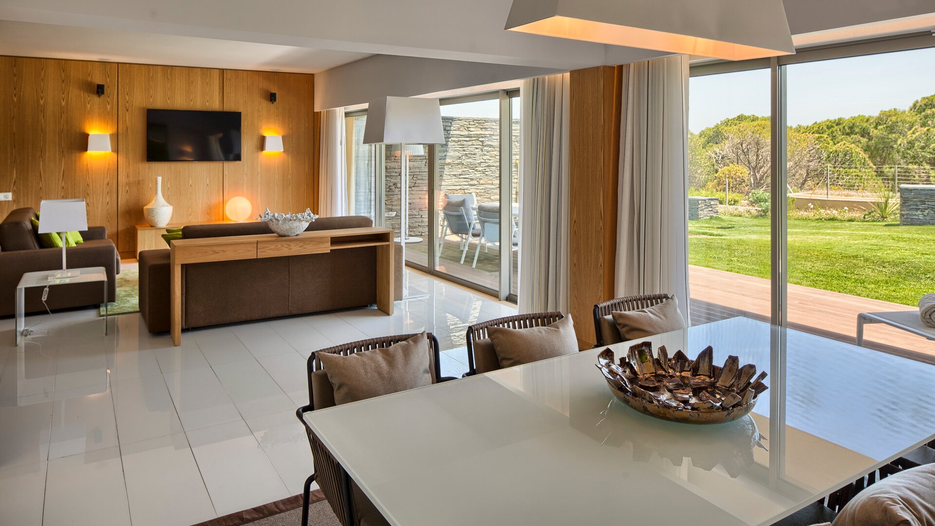 Grand Deluxe Suite with Garden View Living and Dining Area