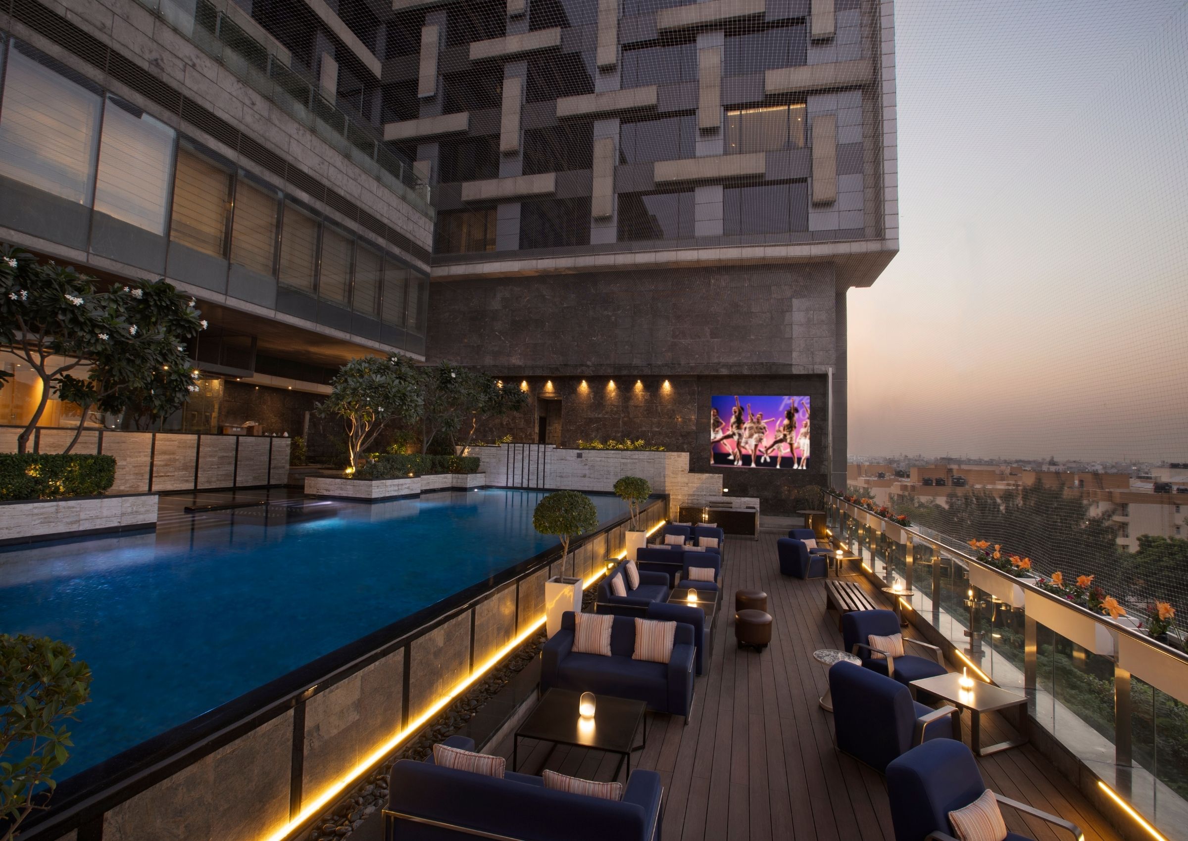 Outdoor pool and terrace at dusk