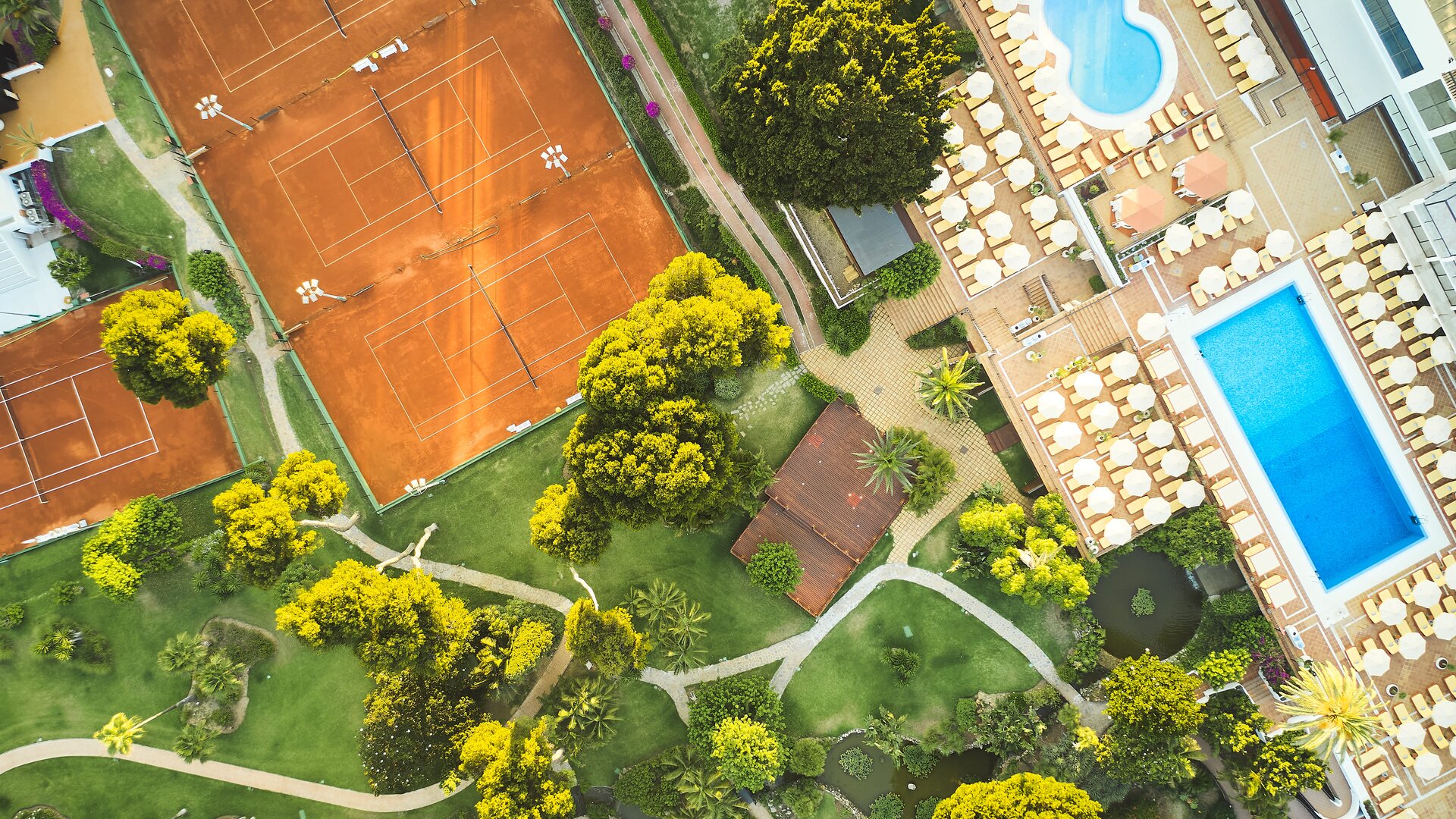 Aerial View of Pool and Tennis Courts