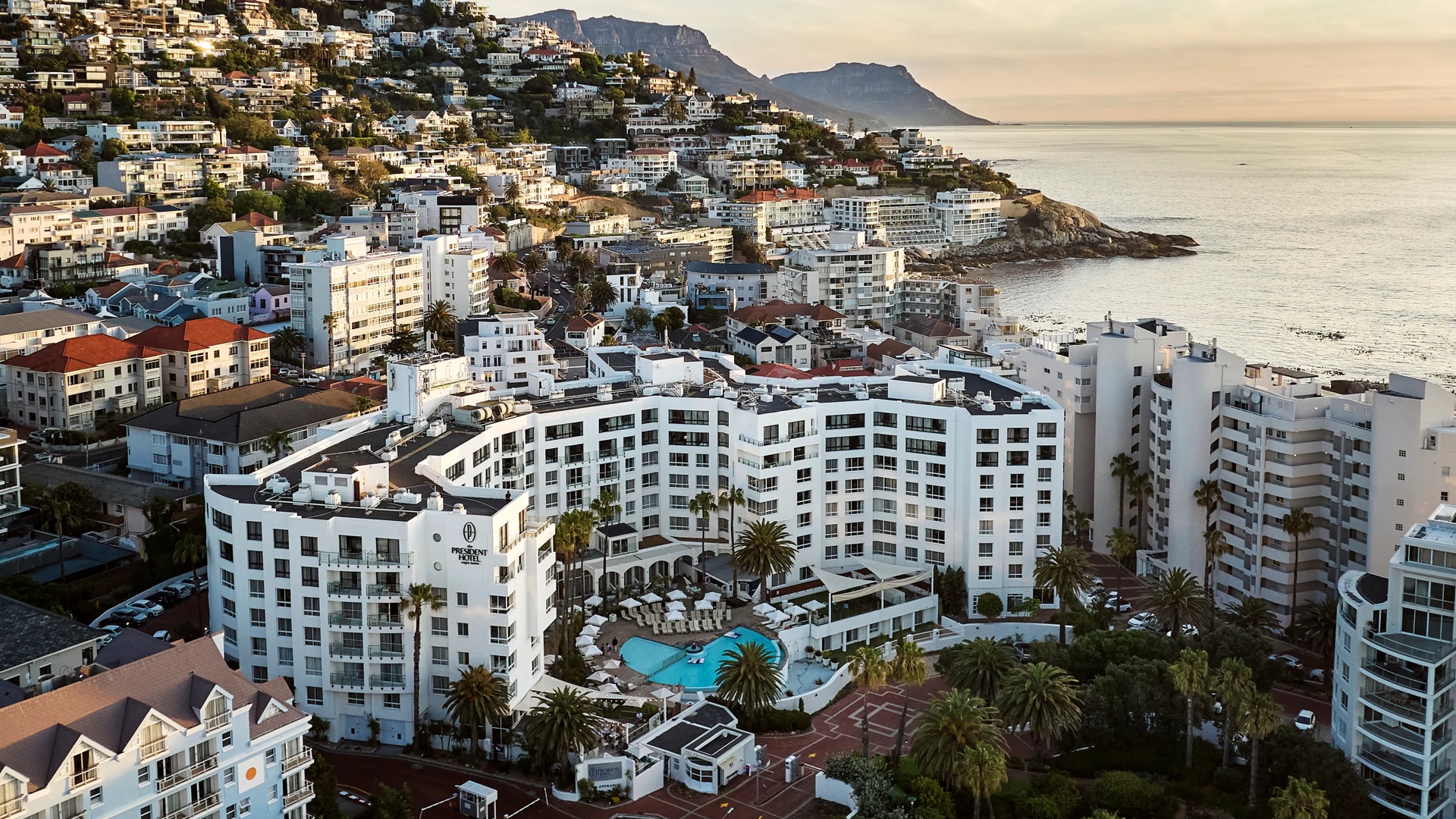 Aerial Exterior View with City and Ocean in the Background