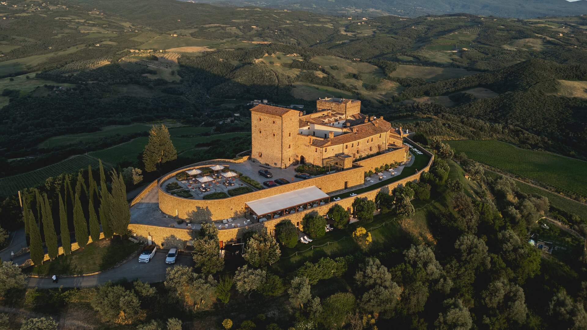 Exterior Aerial View of Property at Sunset