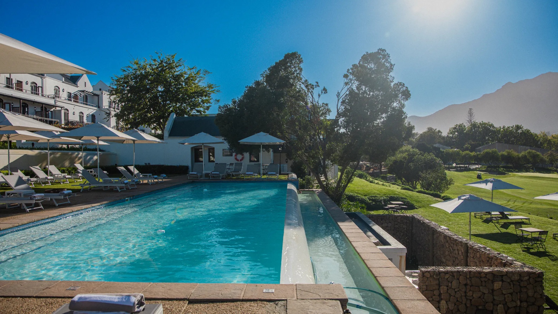 Outdoor Pool Overlooking Lawn