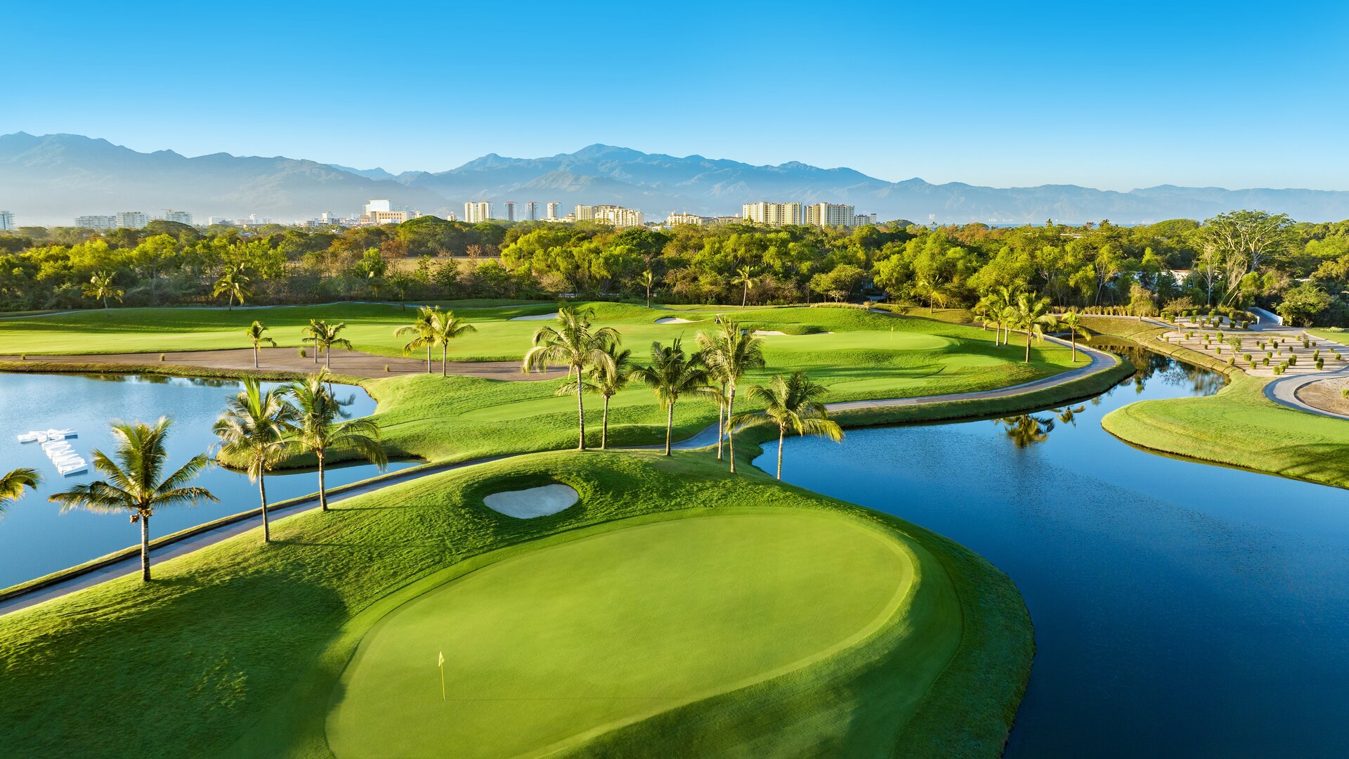 Aerial View of Golf Courses and Landscape in the Background