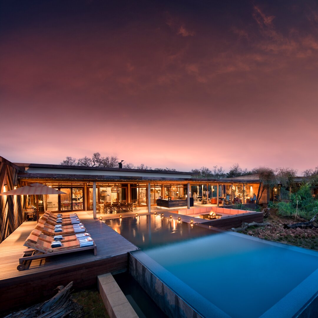 andBeyond Phinda Homestead pool loungers at sunset