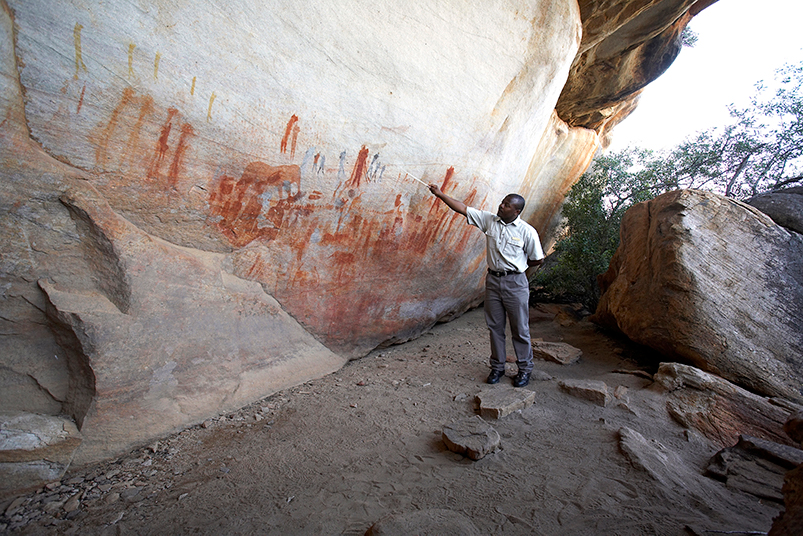 A local guide leads an ancient rock art tour at South Africa’s Bushmans Kloof.