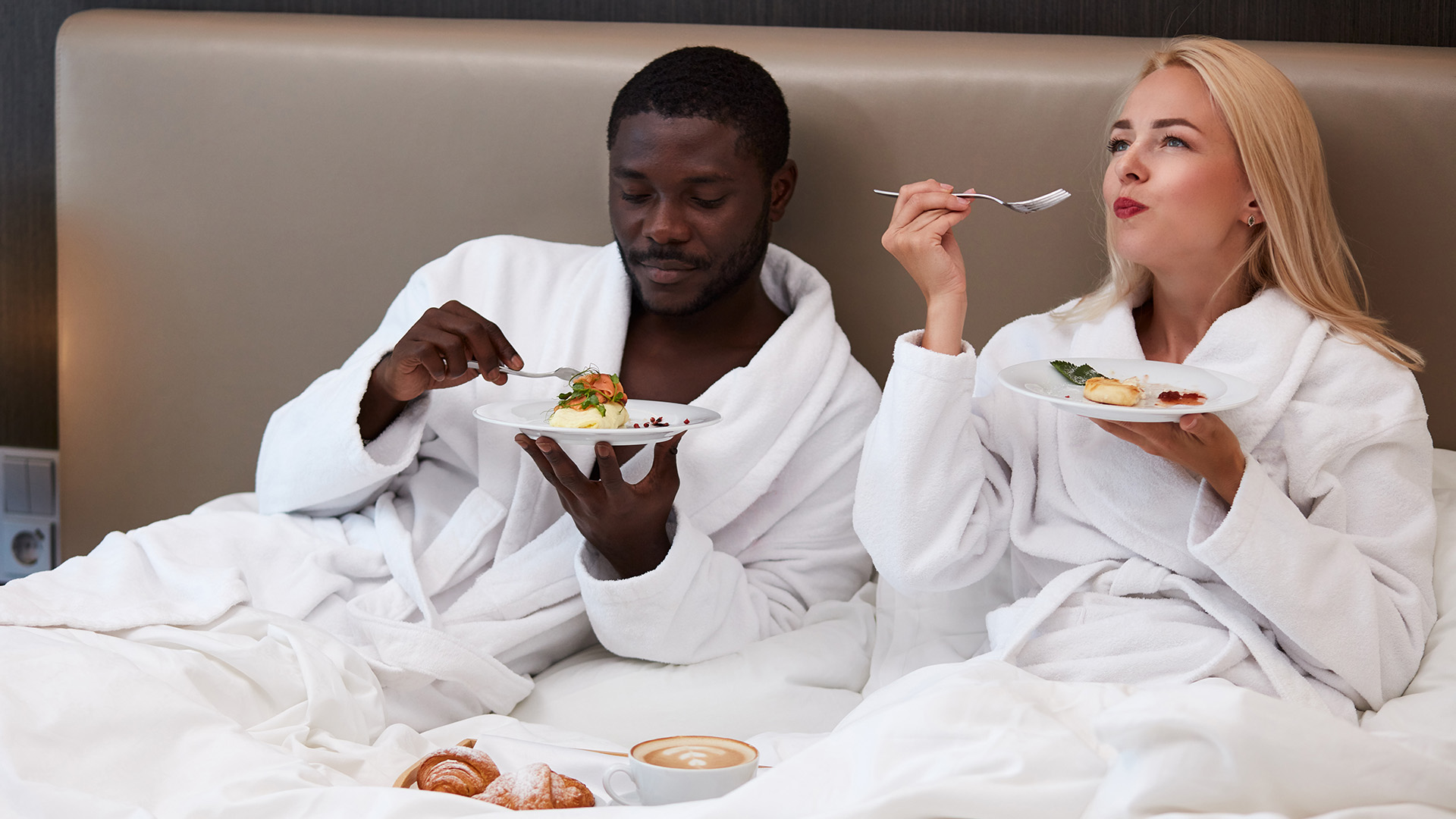 bed and breakfast couple in bed