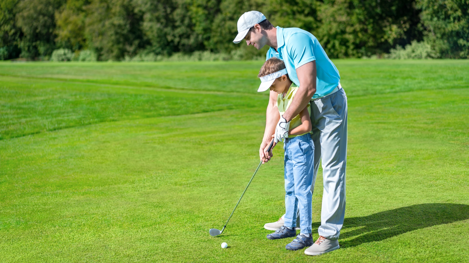 father and son golfing