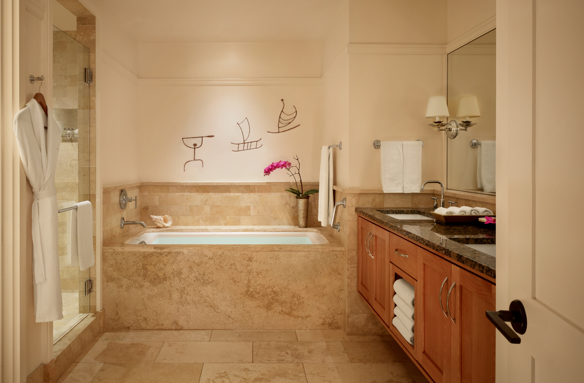 All residences at Montage Kapalua Bay includes two marble bathrooms with deep soaking bathtub, double vanity and separate shower