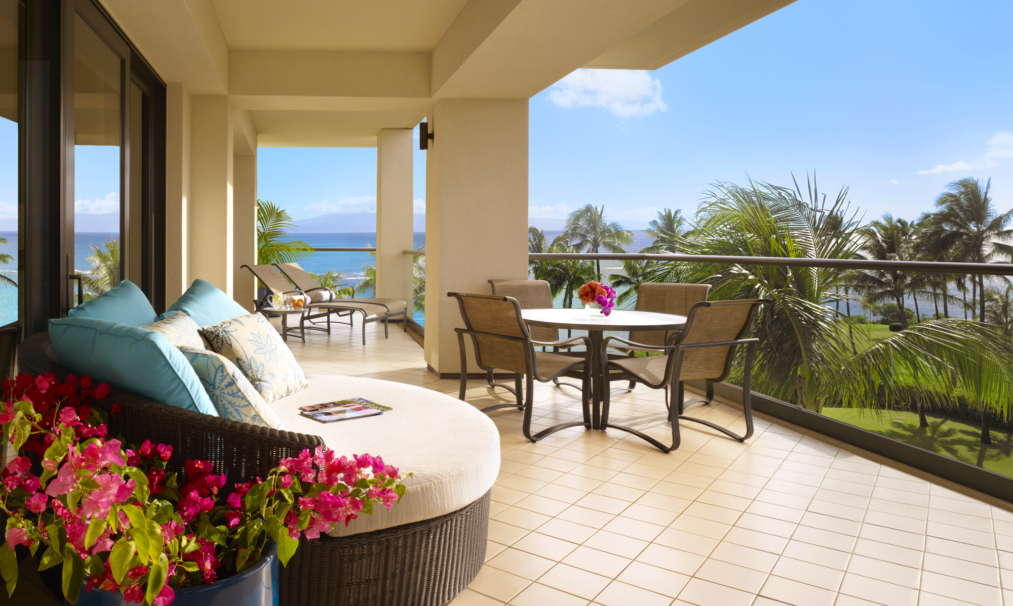 An expansive private lanai accessible from the living room and a master bedroom.