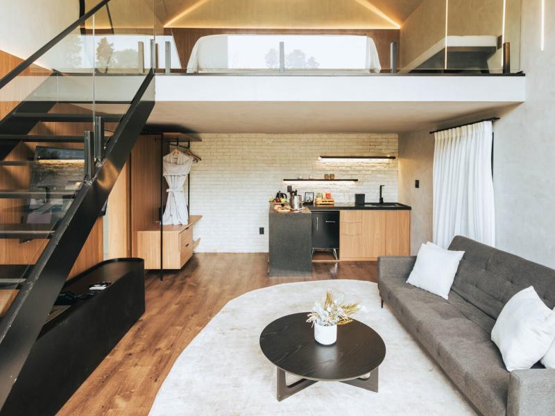 Duplex Living Area and View to Loft Bedroom