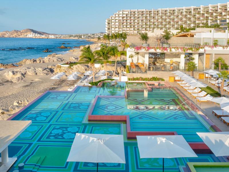 Exterior Side View with Pool and Coastline