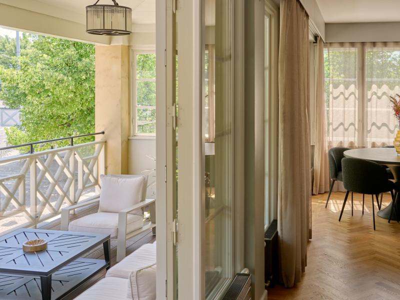 Veranda Suite Dining Area and Doorway to Private Veranda