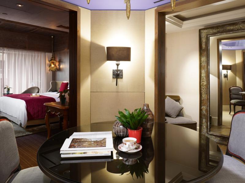 Premier Suite Foyer and Dining Space with View to Bedroom and Living Spaces