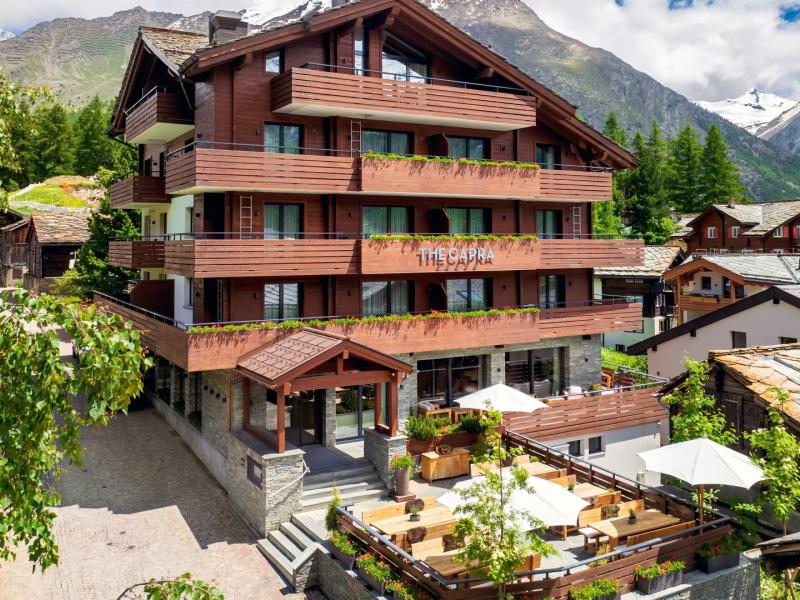 Exterior View with Snow Top Mountains in the Background