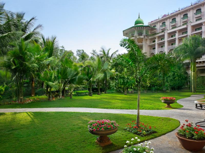 The Leela Palace Bengaluru walking path and gardens.