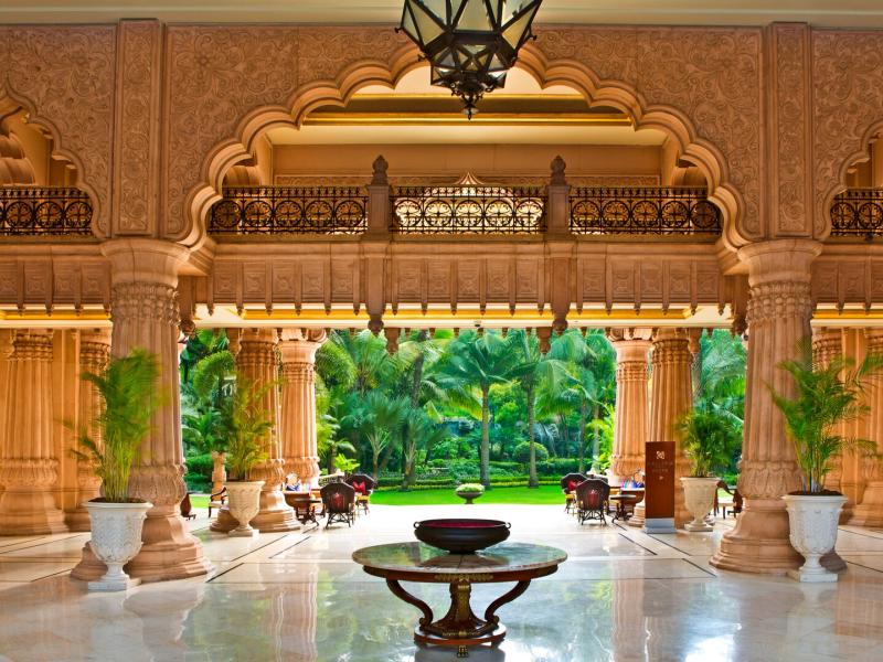 Porte cochère serves as a grand ceremonial arrival point.