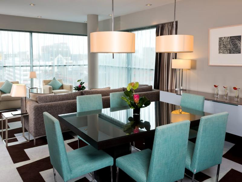 The Penthouse living area offers an expansive, residential-style space ideal for relaxing or hosting privately.