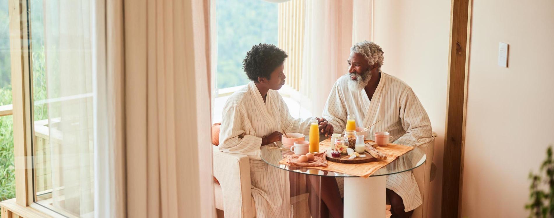 Visa Worlds Offer Two People Enjoying in Room Breakfast