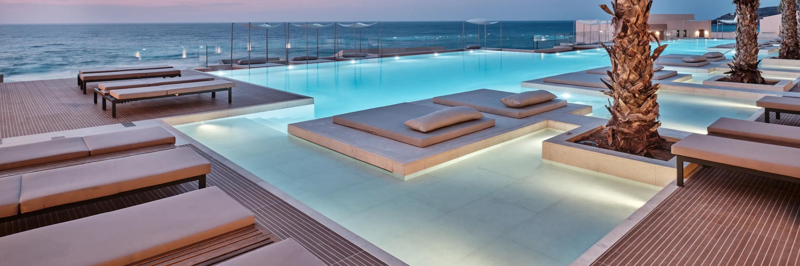 OROS LUXURY BEACH RESORT | Outdoor Pool by the Sea