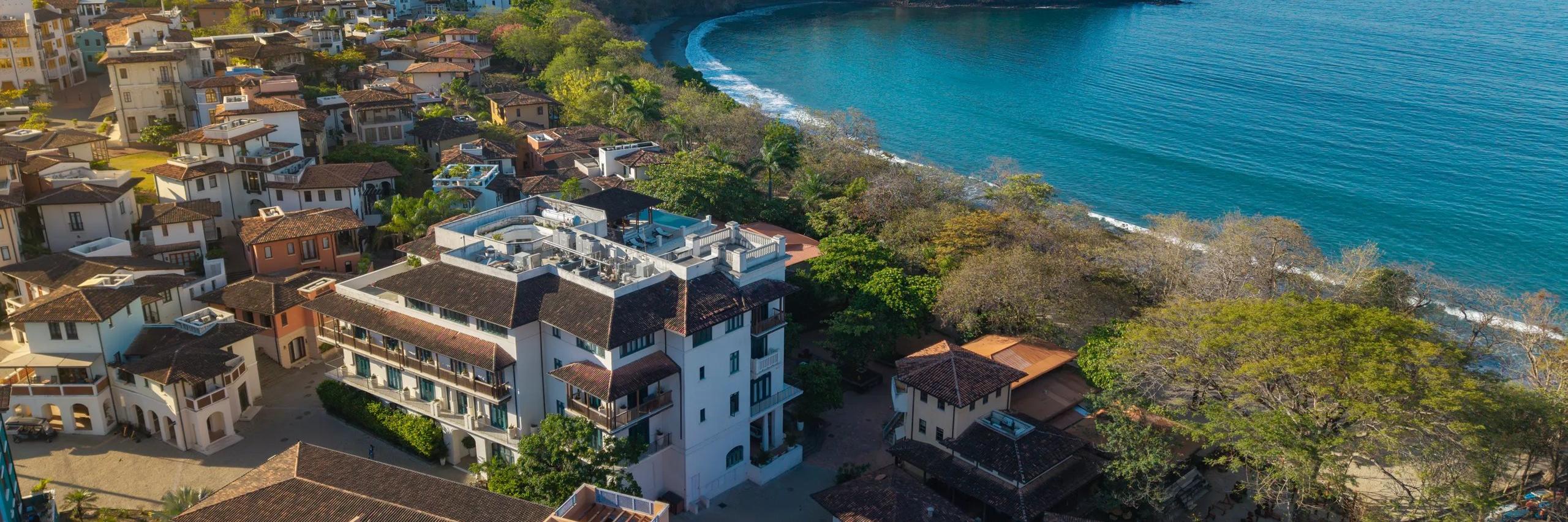 Santarena Hotel | Exterior Aerial View with Surrounding Beach Town