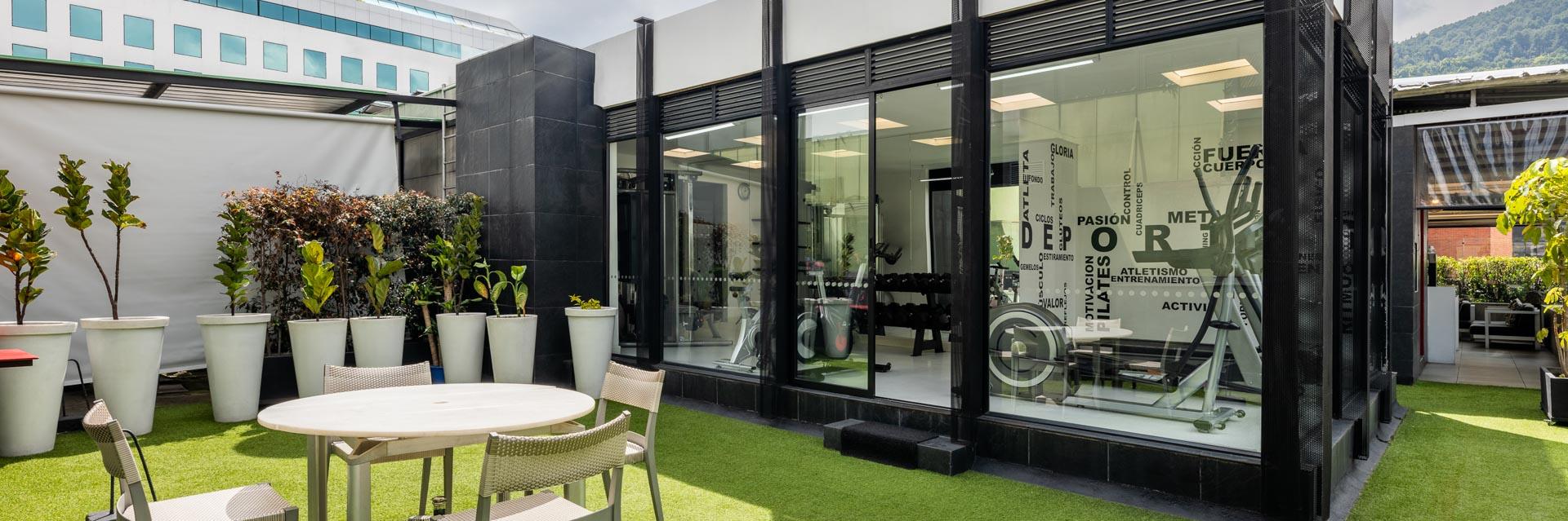 100 Luxury Suites Outdoor Terrace and Gym