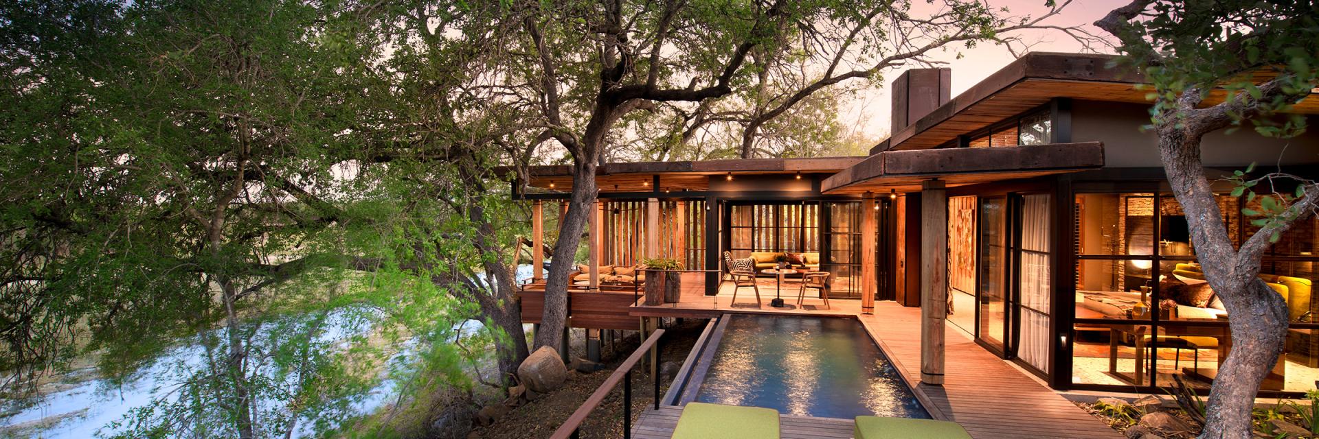 andBeyond Tengile River Lodge Deck with seating and pool
