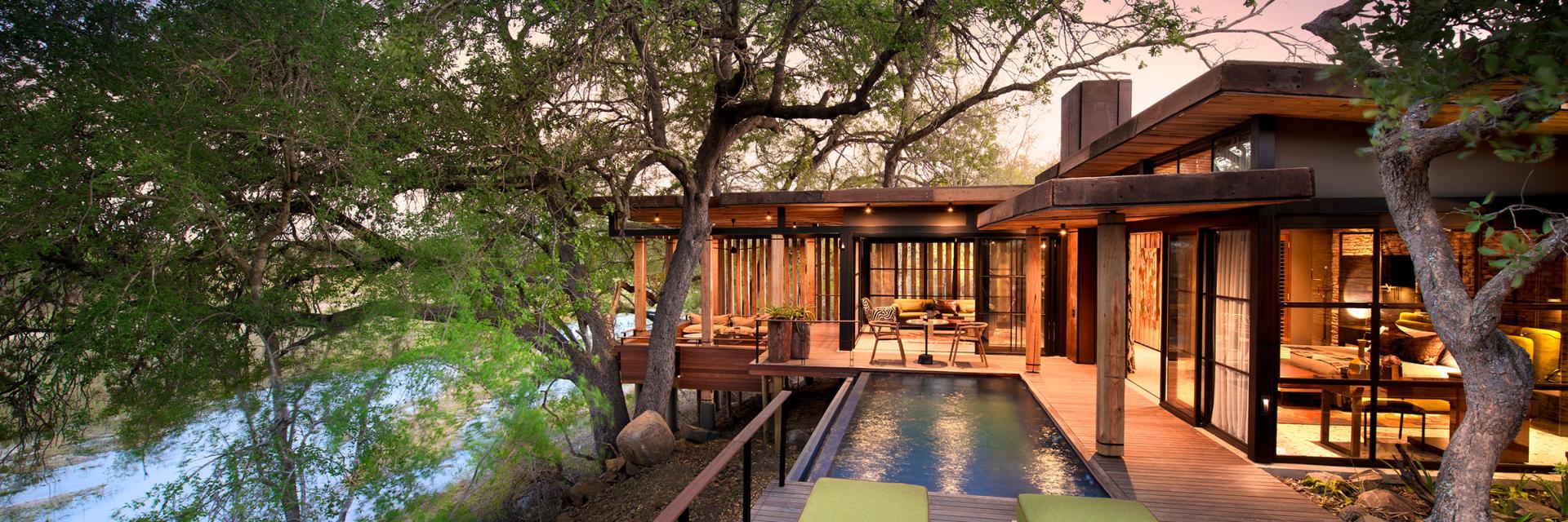 andBeyond Tengile River Lodge Deck with seating and pool